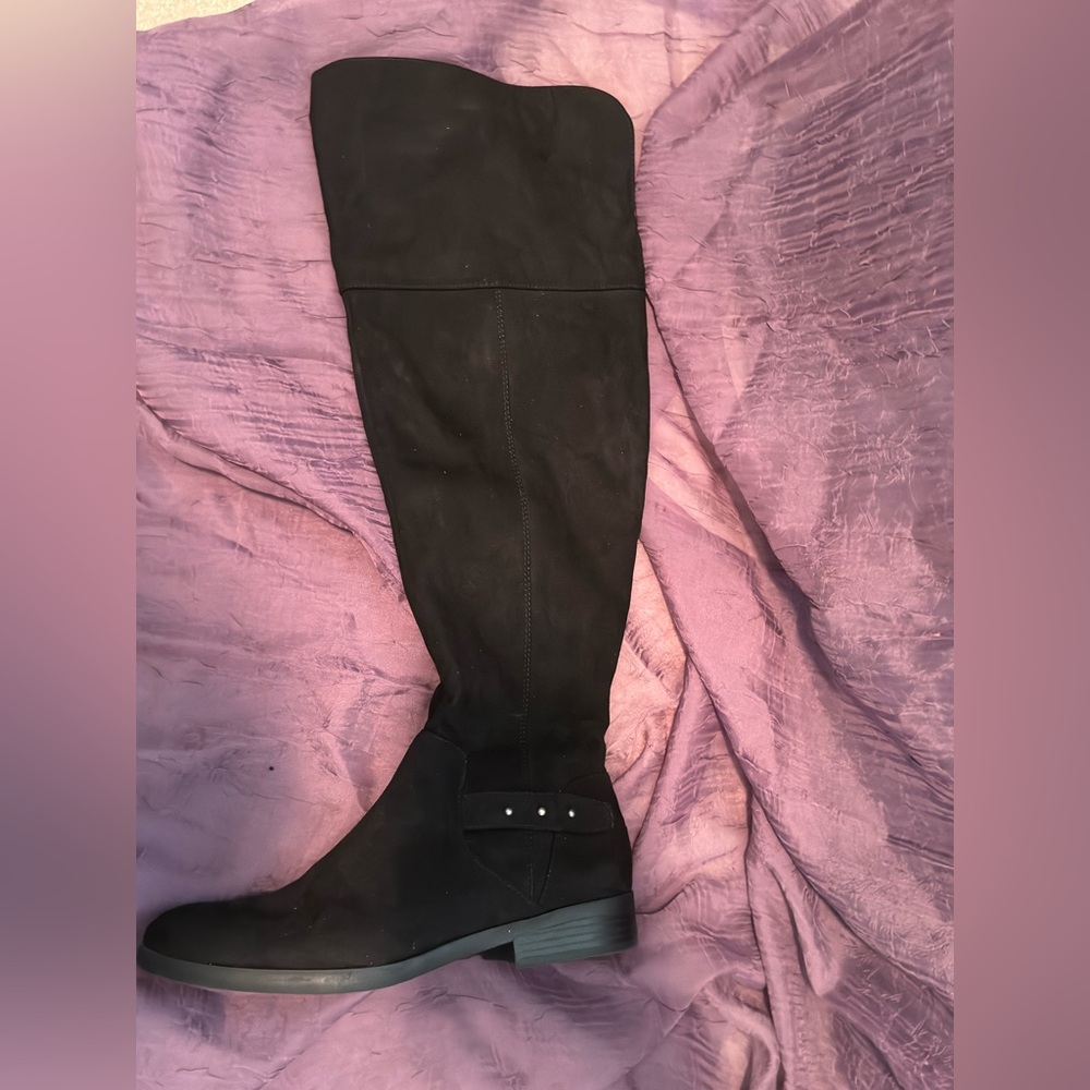 Over the knee faux suede boots. Lower zipper for easy on/off.